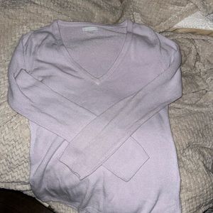 comfortable lilac sweater.